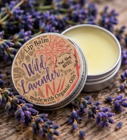 Natural lip balm in a 15ml tube from Madaboutnature, made with organic oils, shown with a smooth, hydrating application.