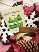 Plantable Christmas gift card from Mad About Nature featuring festive holiday design and eco-friendly, biodegradable paper.