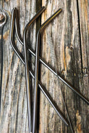 Eco-friendly reusable metal drinking straws by Madaboutnature, stainless steel with sleek, durable design for sustainable sipping.
