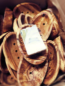 Olive wood soap dish by Madaboutnature, an eco-friendly bathroom accessory with a natural wood grain finish.
