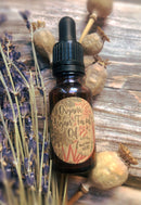 Organic Argan facial oil from Madaboutnature, featuring a clear glass bottle with dropper for skincare application.