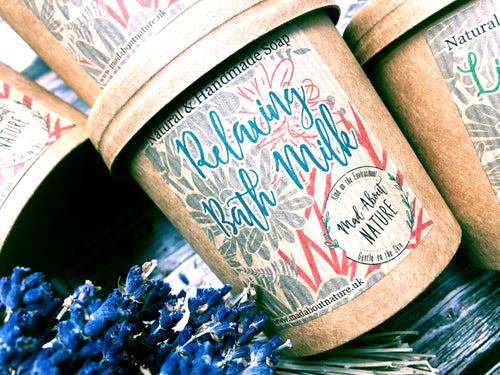 Relaxing bath milk with lavender and geranium from Madaboutnature, showing a bottle with lavender flowers and bath ingredients.