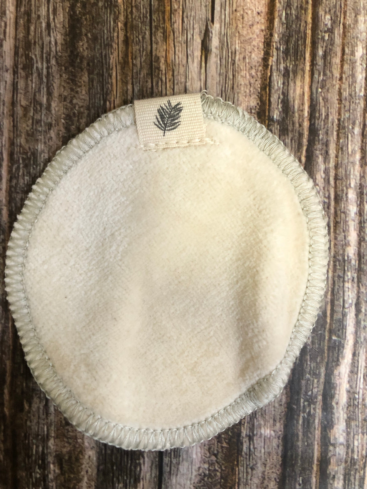 Eco-friendly Madaboutnature reusable make-up remover pads with wash bag, showing 16 soft cotton pads for gentle facial cleansing.